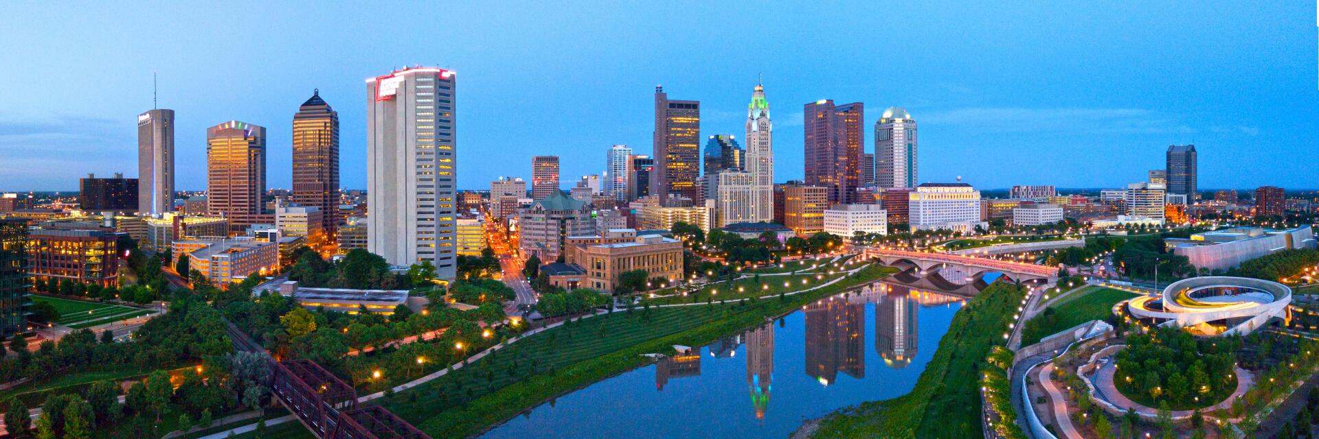 Twilight skyline of Columbus, Ohio, looking south and east with the Scioto River in the foreground