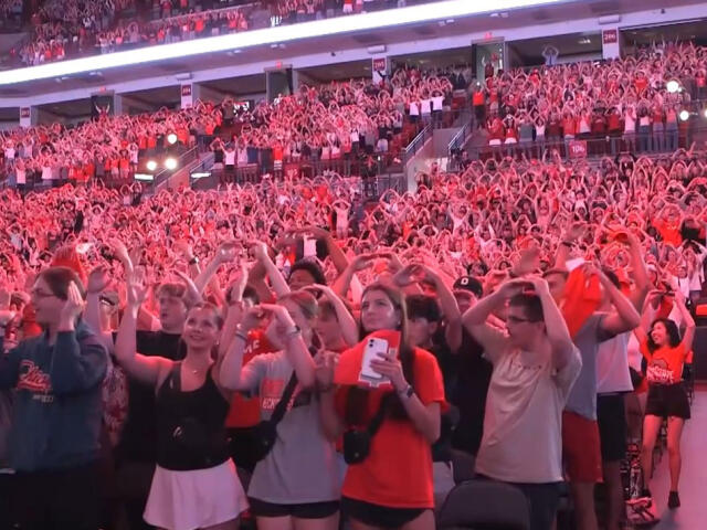 Students doing an O-H at Convocation